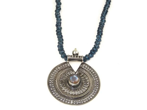 Silver pendant with blue crytals